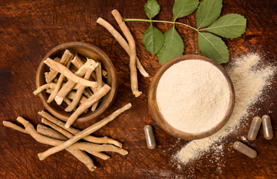Ashwagandha-superfood-powder-and-root-on-cutting-board-on-wooden-table-from-above_Adaptogen_istockphot.com_Credit_eskymaks